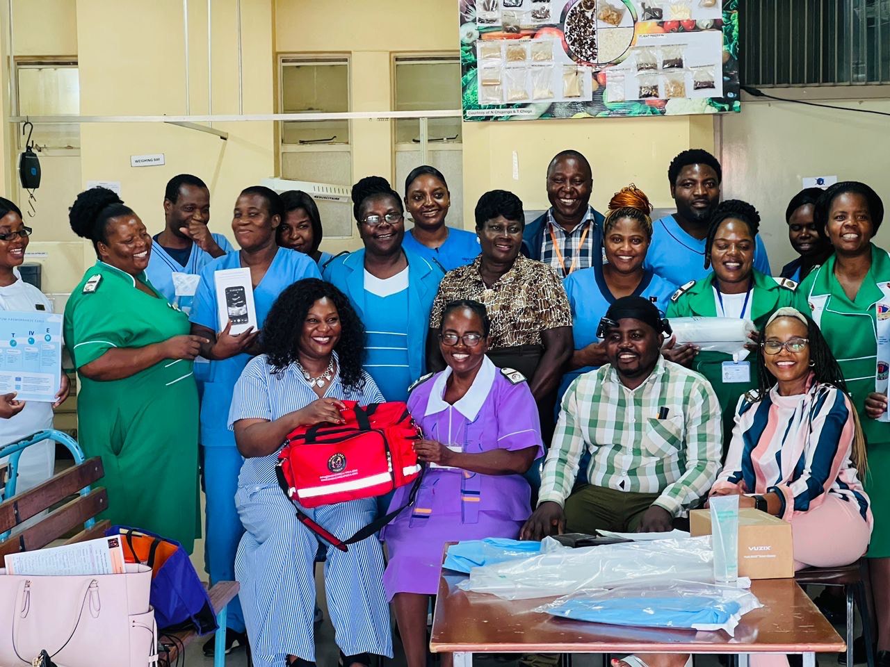 Mama Care Africa team with healthcare workers
